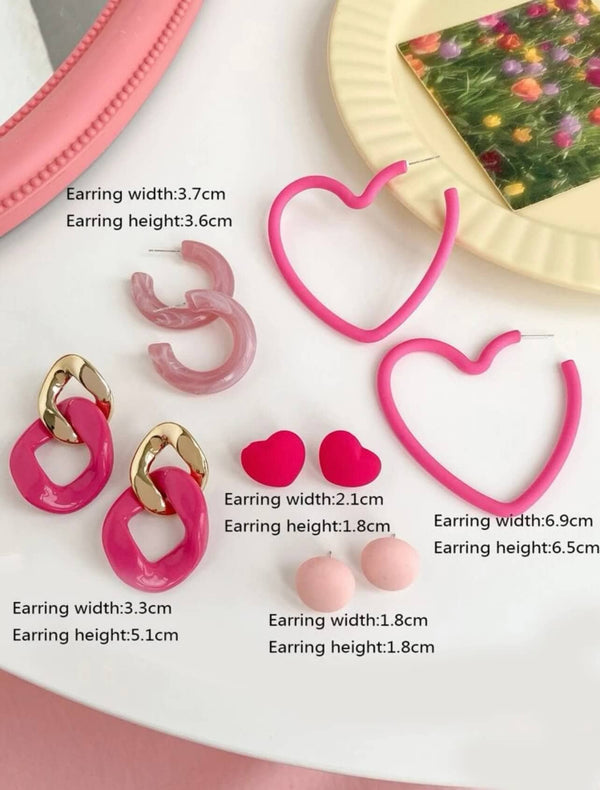 closer look at pink heart shaped earrings
