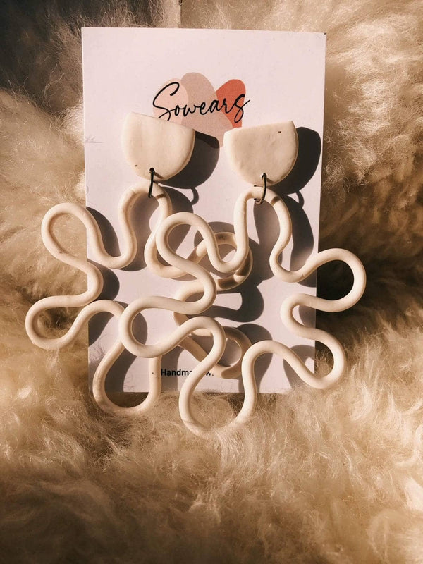 Swigly Coiled Earrings In White Apparel & Accessories  - Sowears