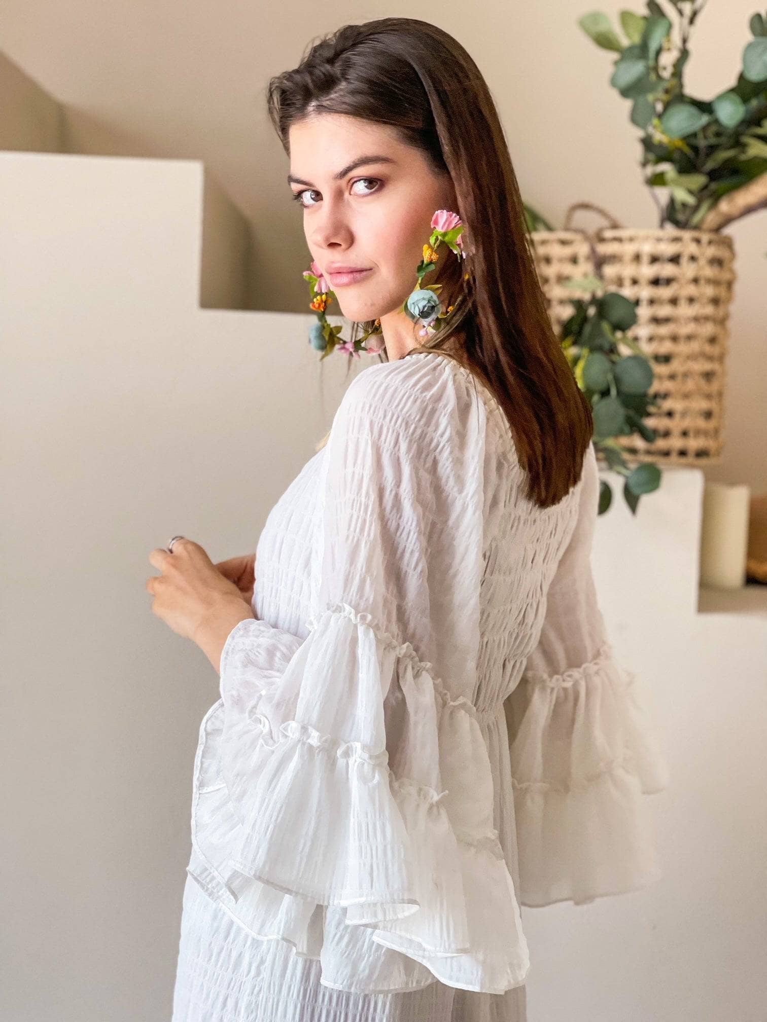 side profile of an off white dress