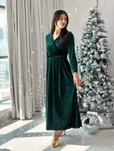 model wearing emerald green velvet long dress by sowears