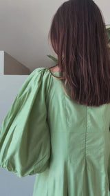 video of a model showing pixie pastel green dress by sowears