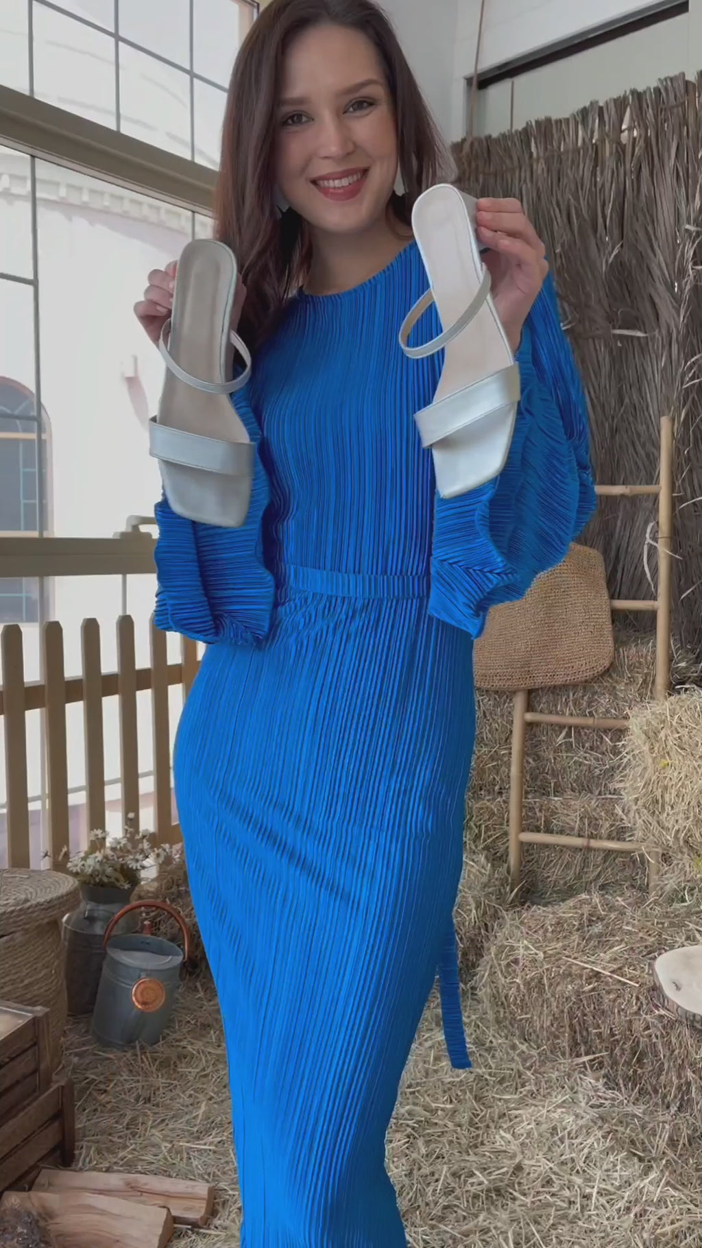 video of model wearing blue bodycon dress