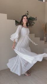 video of a model showcasing ellora off white maxi dress