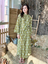 model wearing light green floral maxi dress