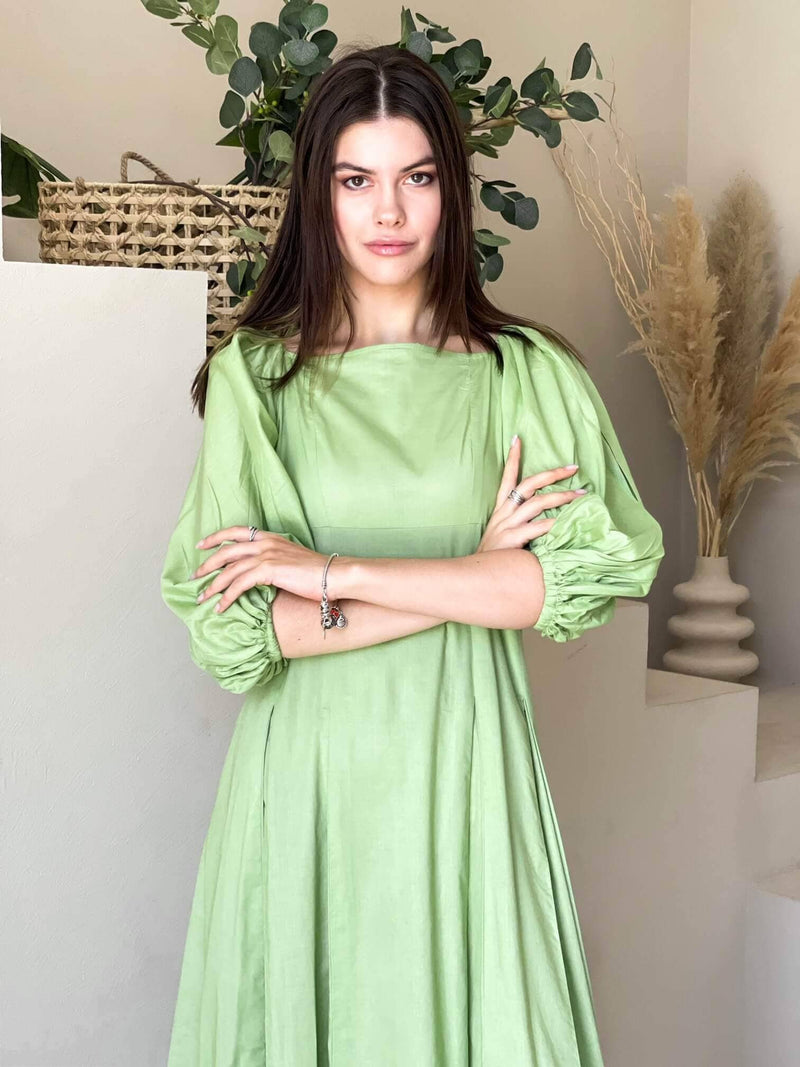 model wearing pixie the pastel green dress by sowears