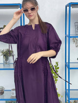model styling the dark purple maxi dress by sowears