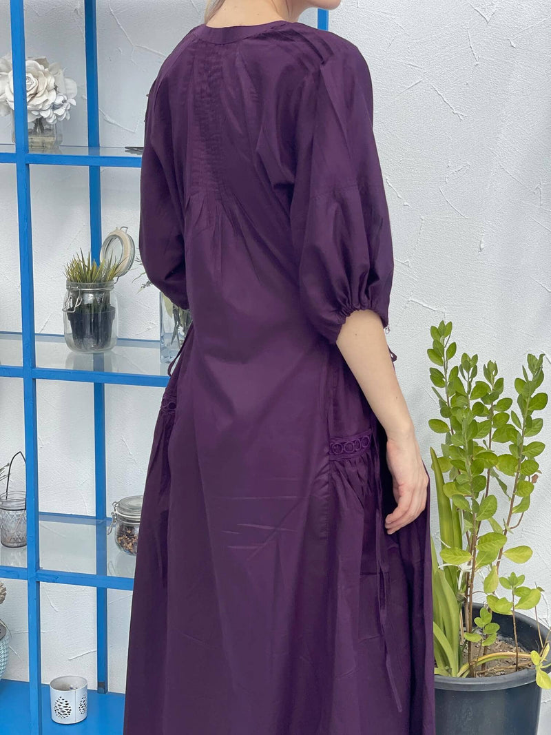 back of dark purple dress 