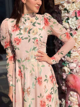 model showing peach floral maxi dress by sowears