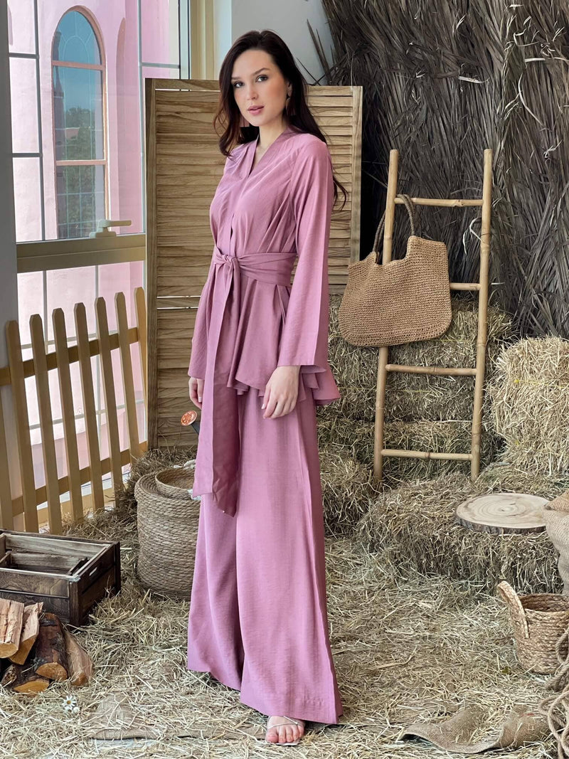 side profile of a model wearing a mauve co ord or western set by sowears