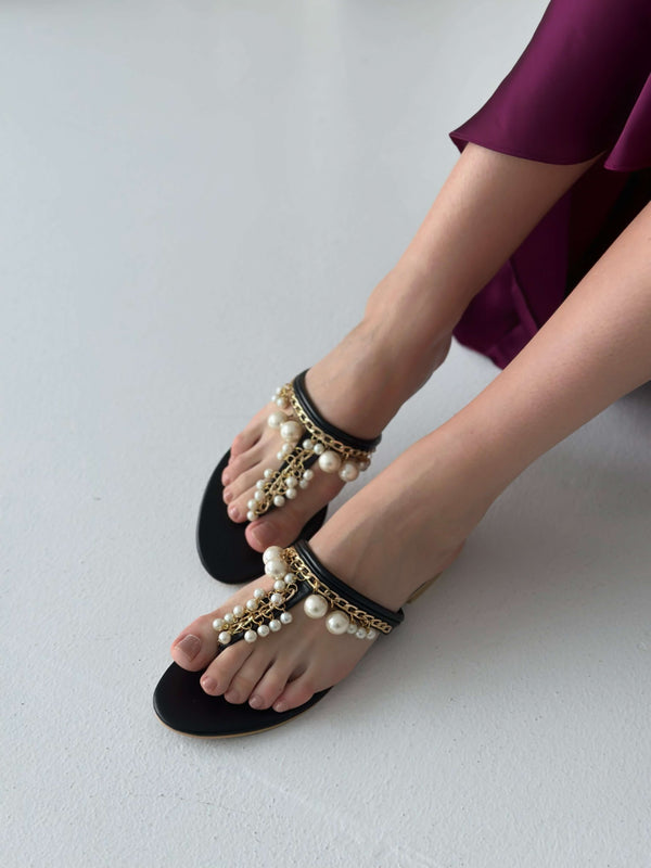 Buy Black Embellished Pearl Sandals by Myra Online at Aza Fashions.