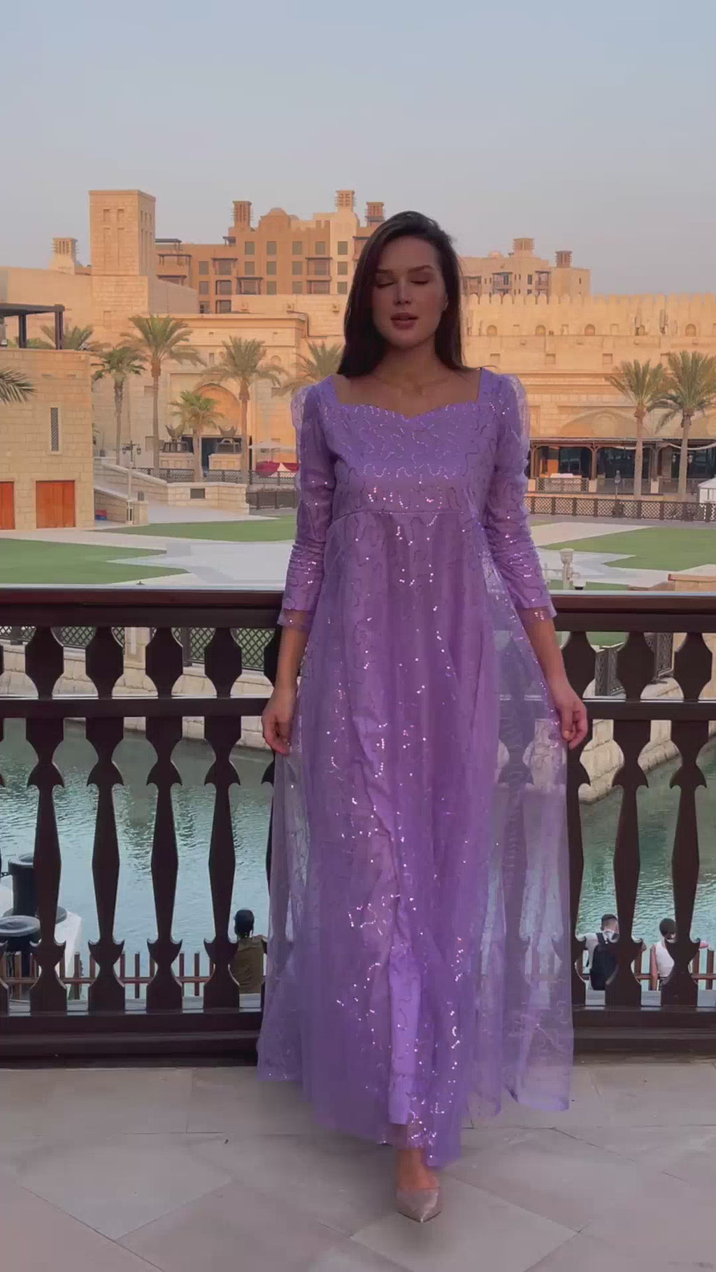 video of a model showing lilac color dress by sowears