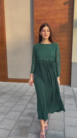 model showing beryl emerald green pleated dress by sowears