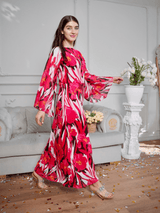 model wearing pink floral long dress by sowears