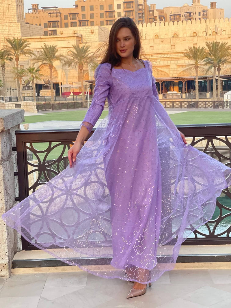model wearing lilac color dress by sowears
