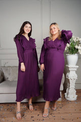 models wearing purple pleated dress