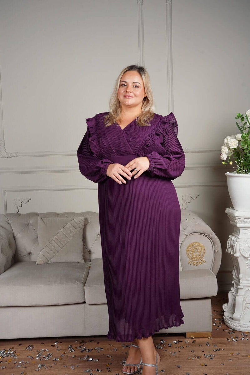 plus size model wearing purple pleated dress by sowears