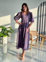 model wearing lavender long purple velvet dress by sowears