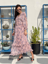 model wearing light peach floral dress by sowears