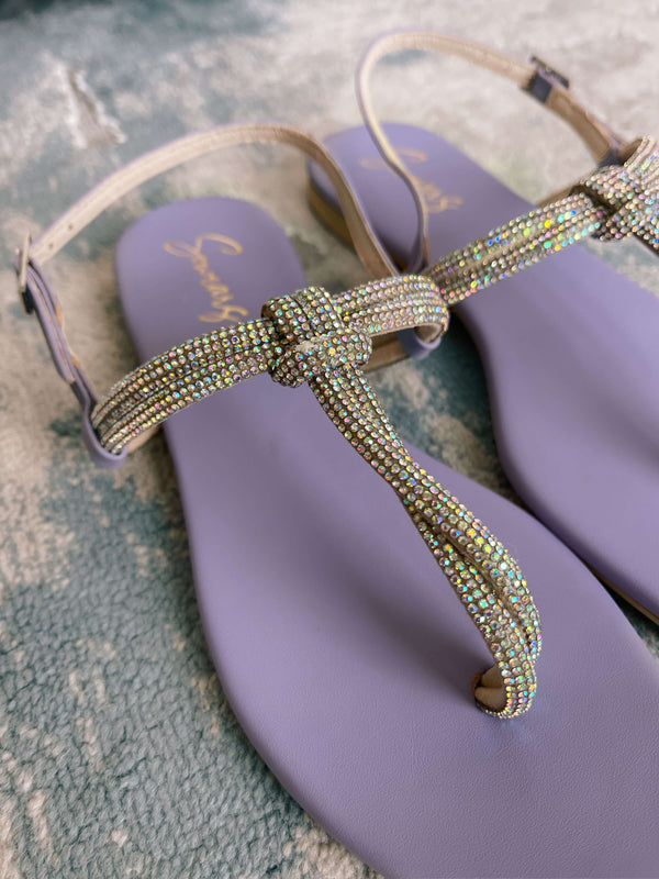 close up of lady lilac flat sandals by sowears