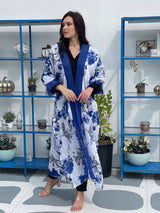 Abstract Blue Floral Shrug by Sowears